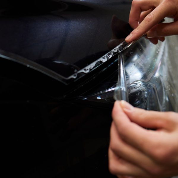 Protection of hood and front of the car with a colorless protective film.